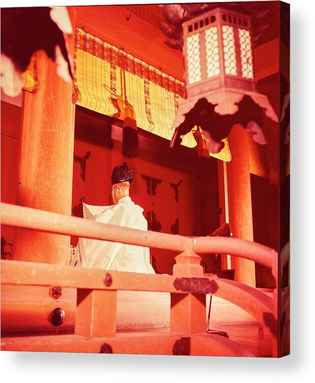Lifestyle Acrylic Print featuring the photograph A Priest Praying In A Shinto Shrine by Nick De Morgoli