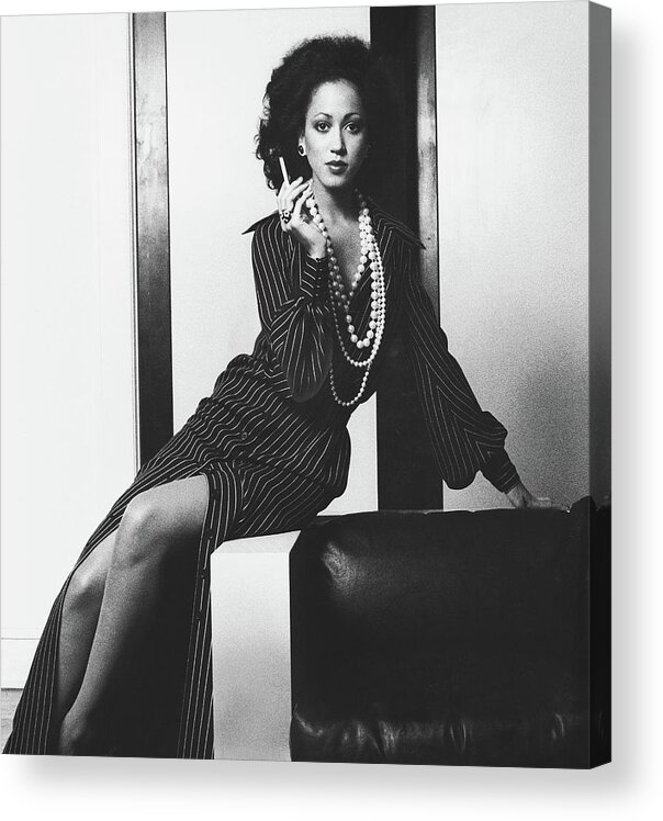Fashion Acrylic Print featuring the photograph Pat Cleveland Holding A Cigarette by Bob Stone