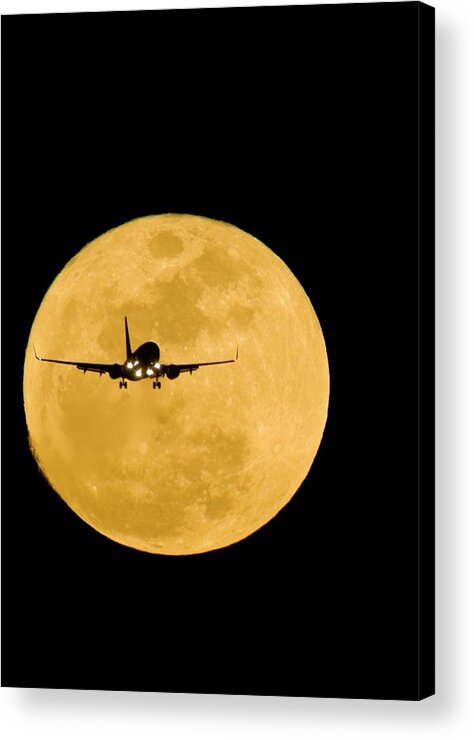 Moon Acrylic Print featuring the photograph Aeroplane Silhouetted Against A Full Moon #1 by David Nunuk