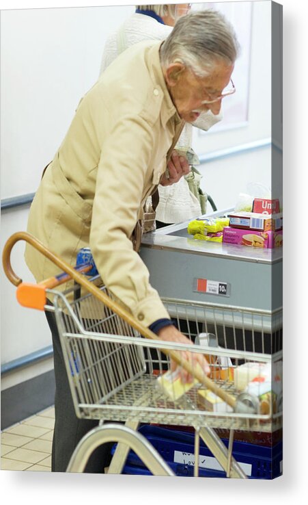 Cane Acrylic Print featuring the photograph Elderly Man At A Check-out by Mary Dunkin/science Photo Library