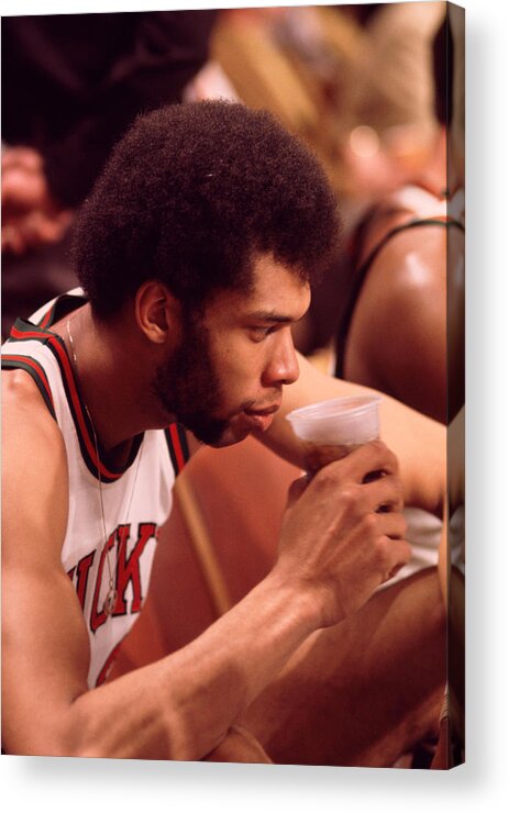 Marvin Newman Acrylic Print featuring the photograph Kareem Abdul Jabbar Takes A Drink by Retro Images Archive