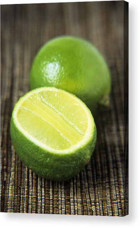 Lime Acrylic Print featuring the photograph Limes by Veronique Leplat