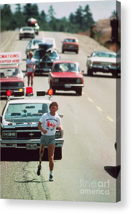 Young Men Acrylic Print featuring the photograph Cancer Victim Terry Fox Running #1 by Bettmann