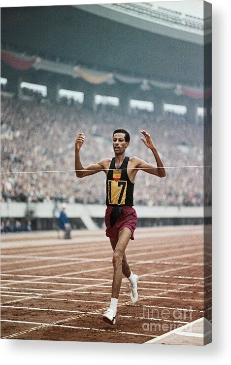 Event Acrylic Print featuring the photograph Bikila Abebe Winning Second Olympic by Bettmann