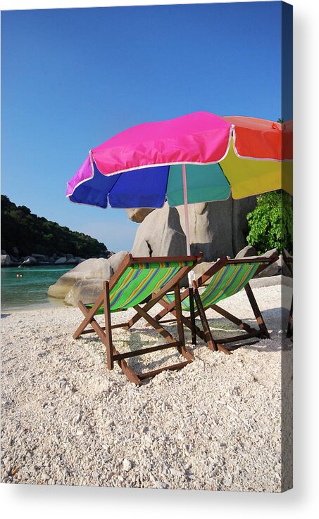 Clear Sky Acrylic Print featuring the photograph Deck Chairs On A Beach In Thailand by Thepurpledoor