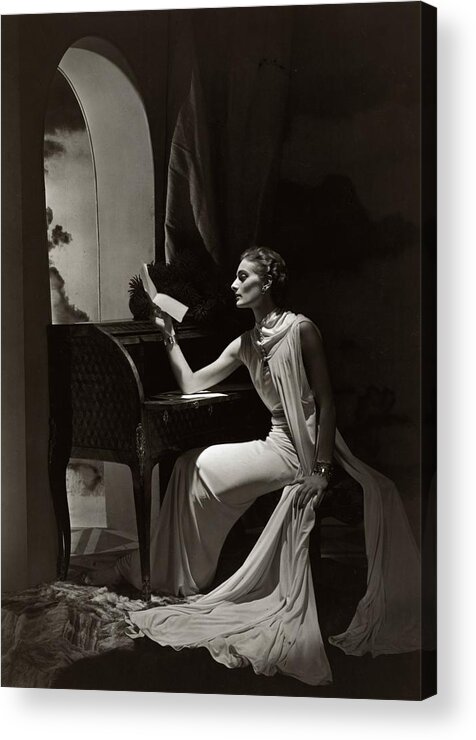 #new2022vogue Acrylic Print featuring the photograph Model Reading At A Roll-top Desk by Horst P Horst