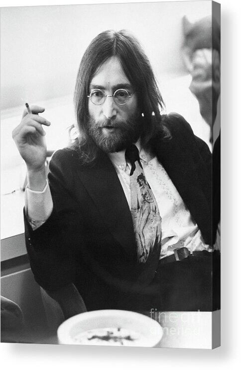 Smoking Acrylic Print featuring the photograph Musician John Lennon Smoking by Bettmann