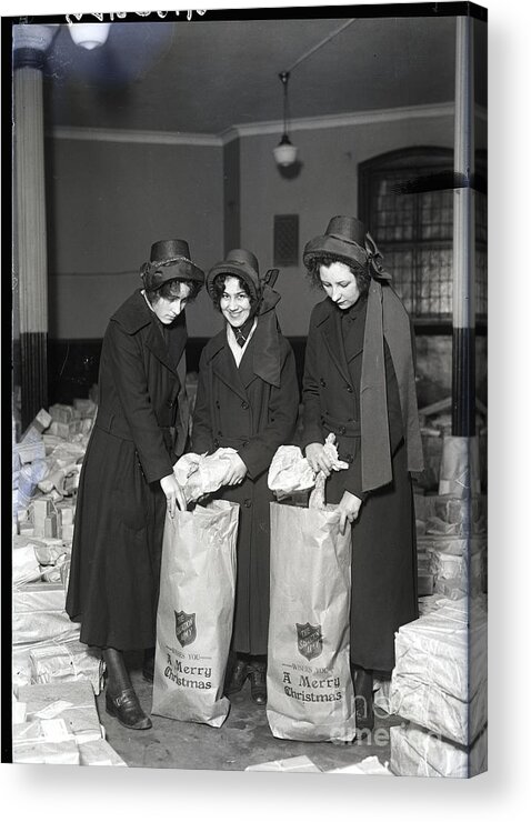People Acrylic Print featuring the photograph Salvation Army Women Filling Baskets by Bettmann
