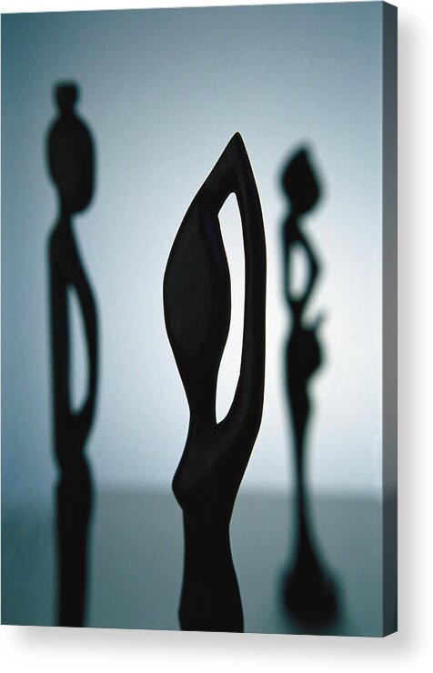 Figurine Acrylic Print featuring the photograph African sculpture, close-up. by Benoit Jeanneton