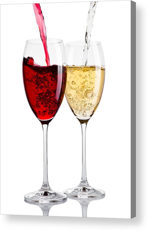 Alcohol Acrylic Print featuring the photograph Glass of red and white wine pouring from bottle by DenisMArt