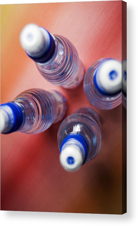 Outdoors Acrylic Print featuring the photograph High angle view of four water bottles by Glowimages