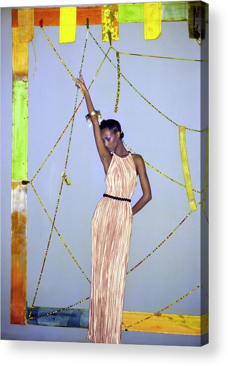 Art Acrylic Print featuring the photograph Iman Wearing A Pink Mary McFadden Pleated Dress by Ishimuro
