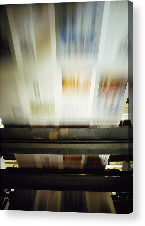Manufacturing Equipment Acrylic Print featuring the photograph Printed paper on printing press, blurred motion by James Hardy