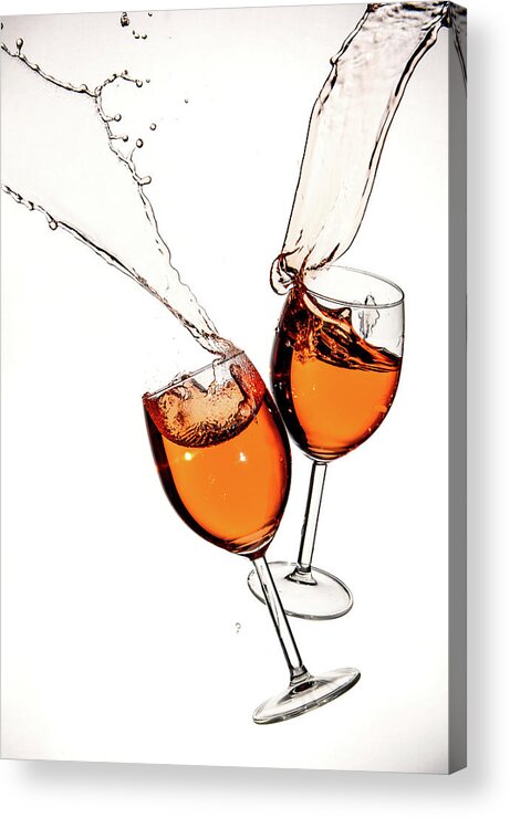 Alcohol Acrylic Print featuring the photograph Red wine in glasses with splashes on a white background isolated by Michalakis Ppalis