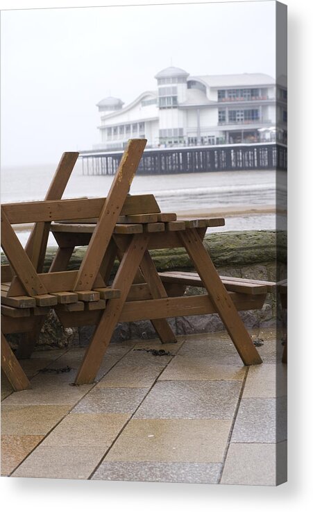 Weston-super-mare Acrylic Print featuring the photograph Upturned wooden tables at out of season seaside by Lyn Holly Coorg