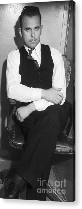 People Acrylic Print featuring the photograph John Dillinger Sitting In Police Custody by Bettmann