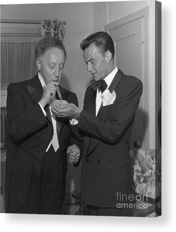 Singer Acrylic Print featuring the photograph Frank Sinatra Lights Cigar For Pianist by Bettmann