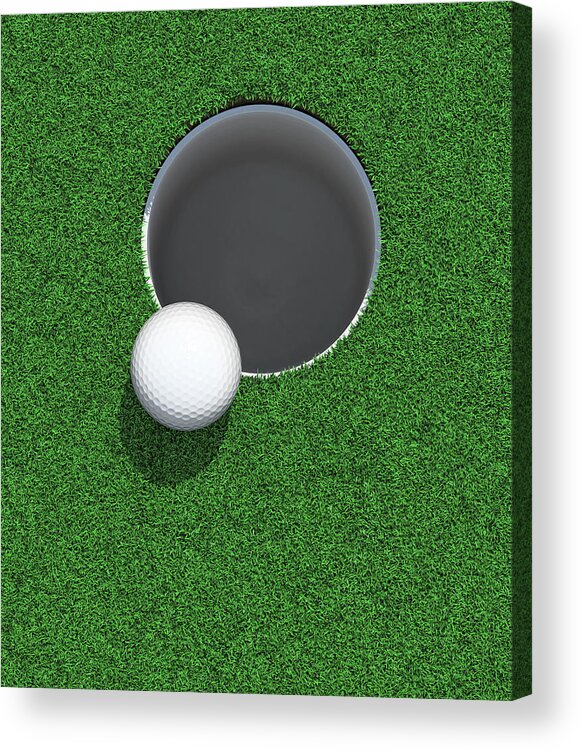 Putting Green Acrylic Print featuring the photograph Golfball On The Lip Of The Cup Hole by Atomic Imagery