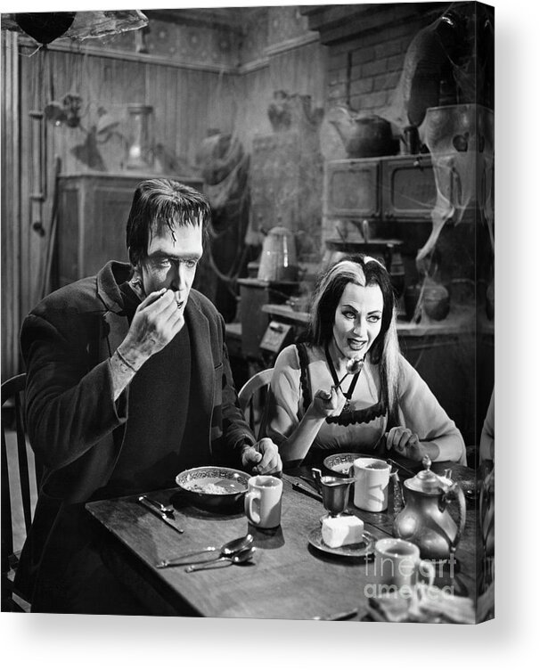 Breakfast Acrylic Print featuring the photograph Herman And Lily Munster At Breakfast by Bettmann