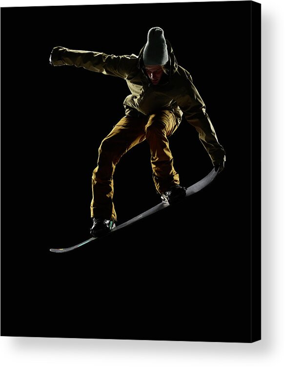 People Acrylic Print featuring the photograph Snowboarder Pulling Front Nose Grab Mid by Lewis Mulatero