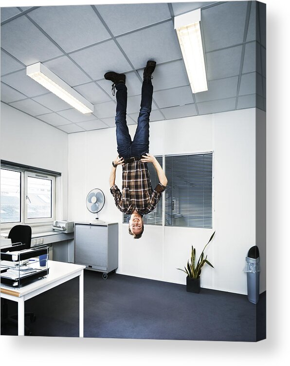 Ceiling Acrylic Print featuring the photograph Man standing upside down on the ceiling. by Henrik Sorensen