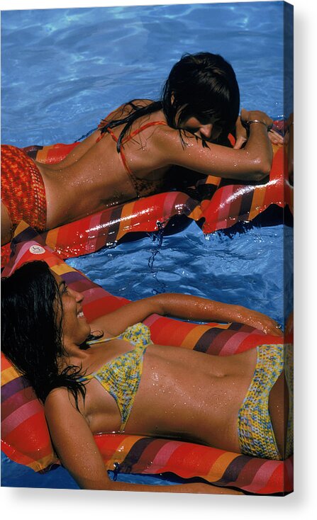 Wind Acrylic Print featuring the photograph Girls On Lilos by Slim Aarons