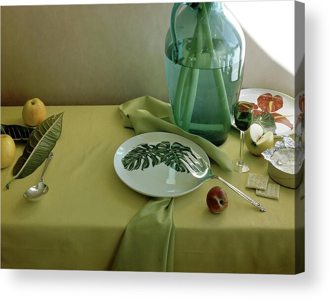 Table Setting Acrylic Print featuring the photograph Plates, Apples And A Vase On A Green Tablecloth by Horst P. Horst