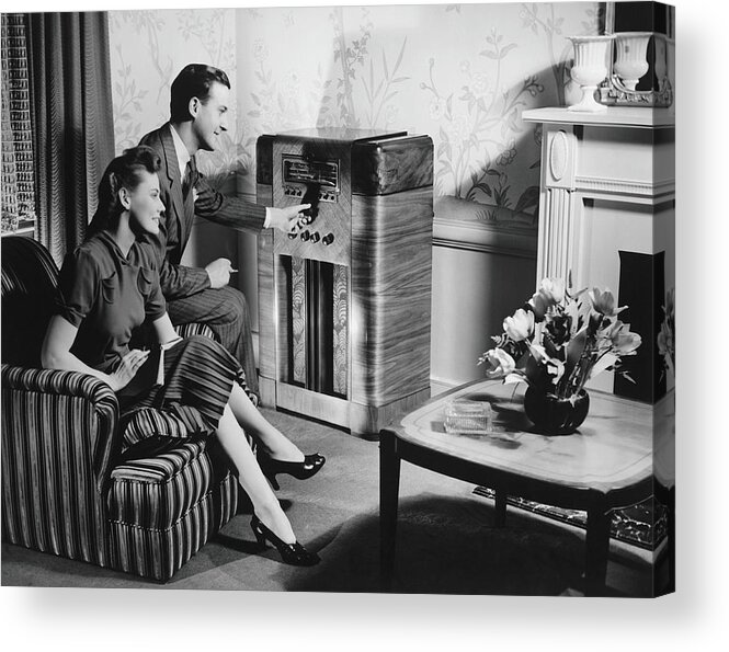 Heterosexual Couple Acrylic Print featuring the photograph Couple Listening To Radio In Living by George Marks