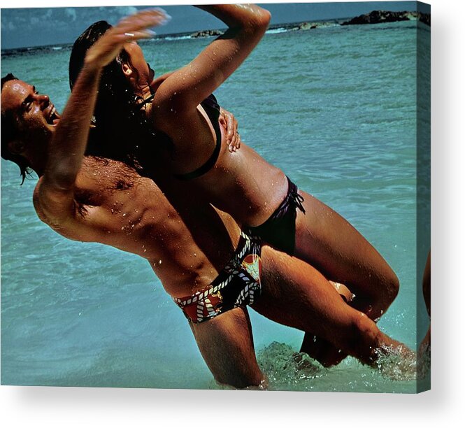 #new2022 Acrylic Print featuring the photograph Couple Playing In The Sea by Jacques Malignon