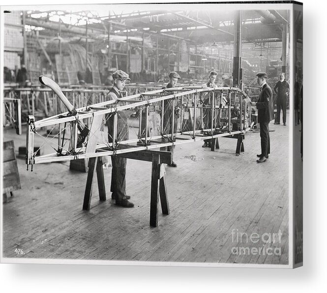 People Acrylic Print featuring the photograph Factory Workers Work On Aircraft Wing by Bettmann