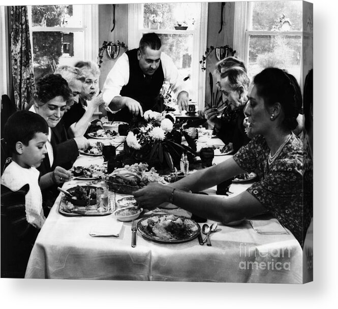 Child Acrylic Print featuring the photograph Family Having Thanksgiving Dinner by Bettmann