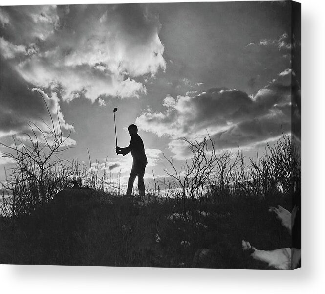 1950-1959 Acrylic Print featuring the photograph Golfer In Silhouette by Fpg