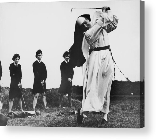 Education Acrylic Print featuring the photograph Golfing Nun by Central Press