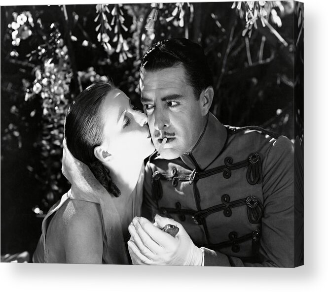 Greta Garbo Acrylic Print featuring the photograph JOHN GILBERT and GRETA GARBO in THE FLESH AND THE DEVIL -1926-. by Album