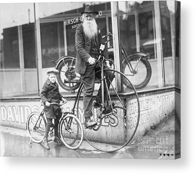 Child Acrylic Print featuring the photograph Little Boy And Grandfather On Bicycles by Bettmann