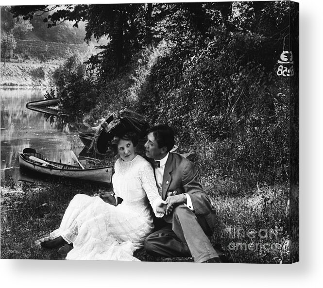 People Acrylic Print featuring the photograph Lovers Relaxing Along The Shore by Bettmann