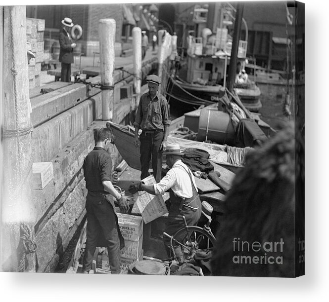 People Acrylic Print featuring the photograph Men Unloading Crates Of Rum by Bettmann