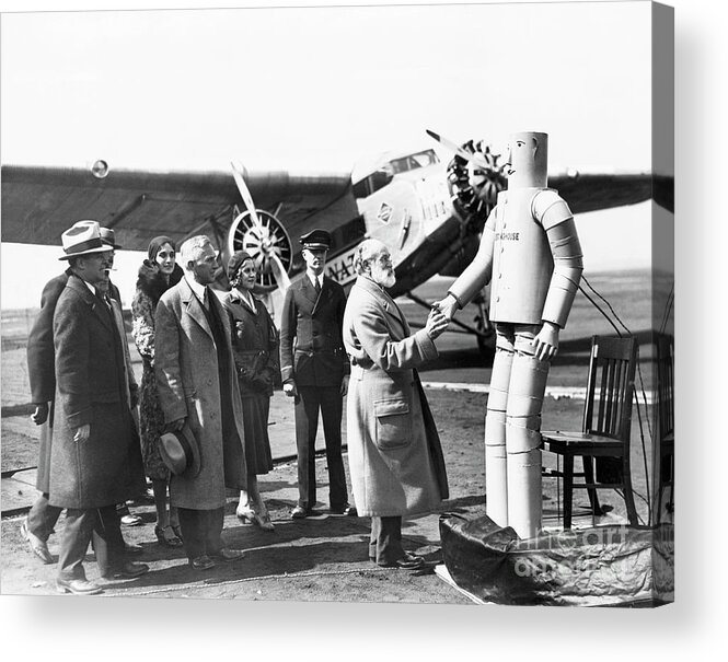 People Acrylic Print featuring the photograph Robot Shakes Elderly Pilots Hand by Bettmann