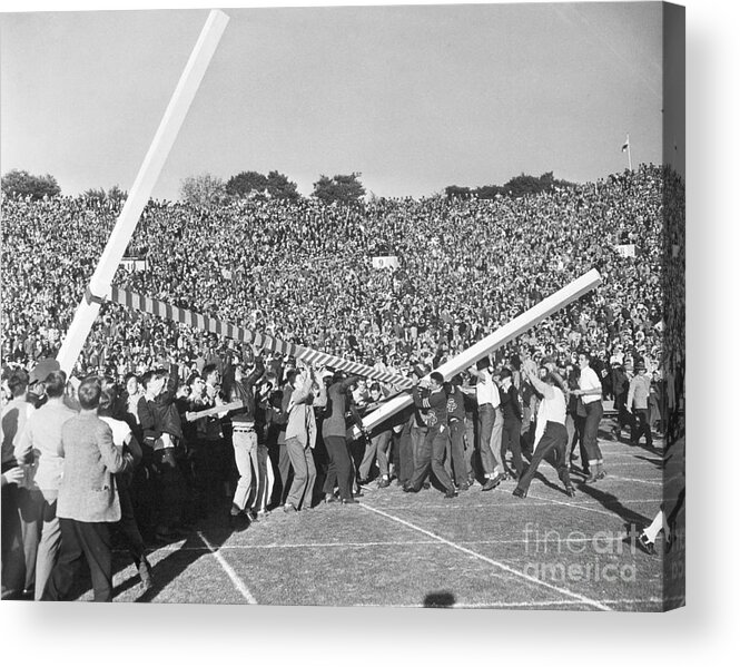 Young Men Acrylic Print featuring the photograph Spectators Tearing Down Goal Post by Bettmann