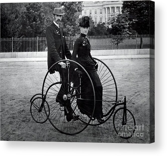 People Acrylic Print featuring the photograph Two Adults On Bicycle by Bettmann