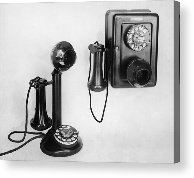 People Acrylic Print featuring the photograph Two Old-fashioned Telephones by Authenticated News