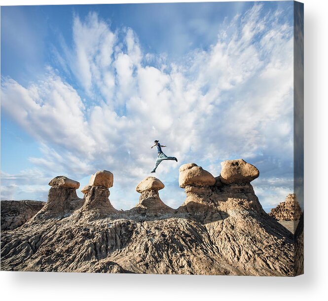 People Acrylic Print featuring the photograph A man doing Parkour on rocks in the desert by Robb Reece