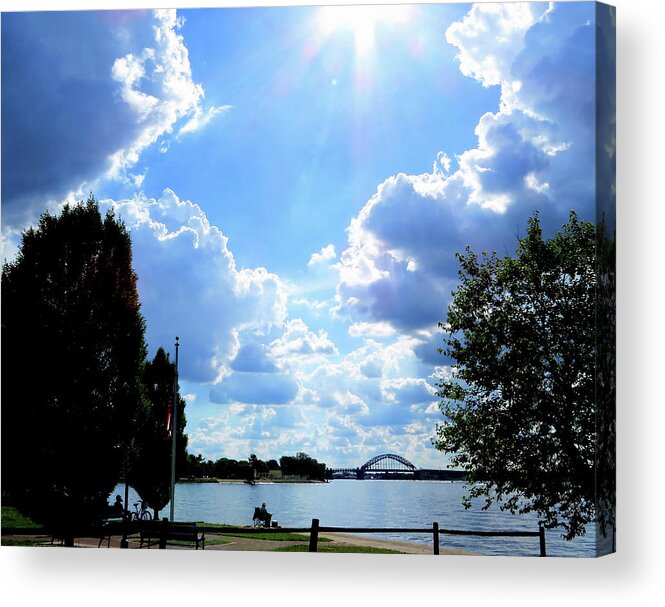 Clouds Acrylic Print featuring the photograph Sunburst Over the Delaware River in Riverton, New Jersey by Linda Stern