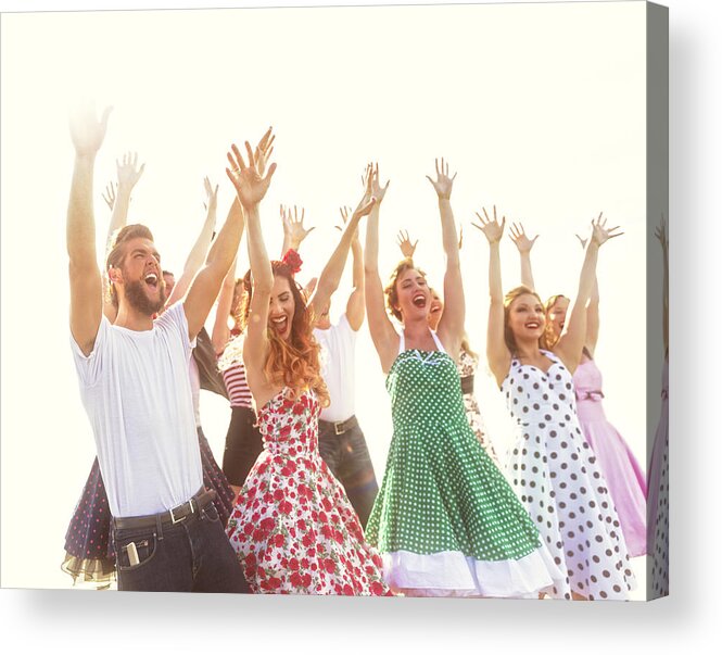 Celebration Acrylic Print featuring the photograph Young Adults Celebrating a Good Time by TerryJ