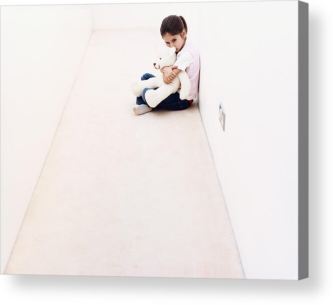 4-5 Years Acrylic Print featuring the photograph Young Girl Sitting Alone in a Corridor and Hugging a Cuddly Toy by Dylan Ellis