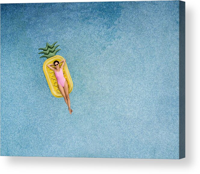 Recreational Pursuit Acrylic Print featuring the photograph Carefree woman on inflatable pineapple by Orbon Alija