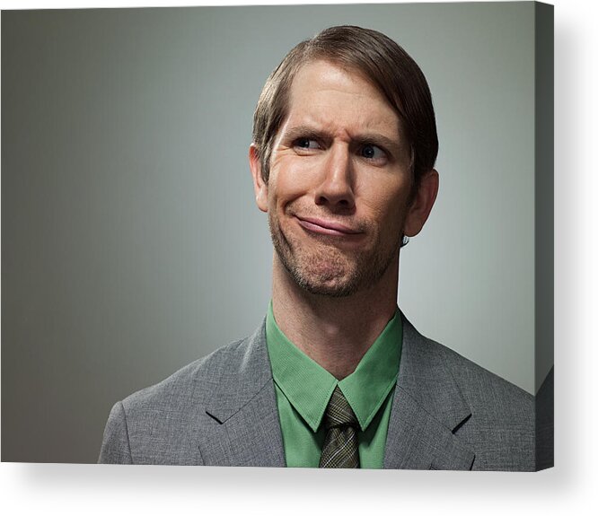 Confusion Acrylic Print featuring the photograph Confused mid adult businessman, portrait by Image Source