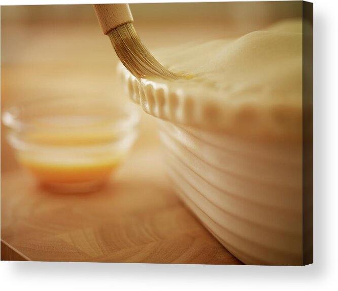 Baked Pastry Item Acrylic Print featuring the photograph Pastry Being Brushed With Egg Wash by Adam Gault
