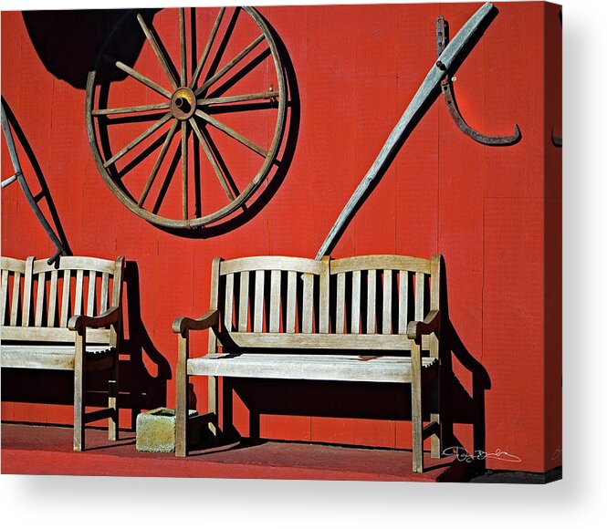 Red Wall Acrylic Print featuring the photograph Red Wall With Benches And Wagon Wheel by Dan Barba