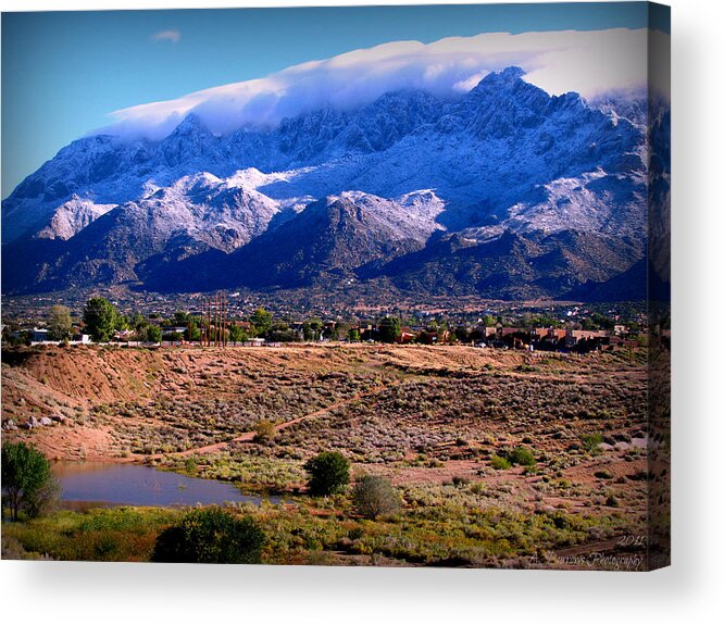 Sandia Crest Acrylic Print featuring the photograph Snow Covered Mountains Above the Pond by Aaron Burrows